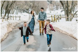 Family pictures of a family of four at Big Springs Park in Provo Canyon in the snow shot by Maren Elizabeth Photography in March. | Arizona Family Photographer