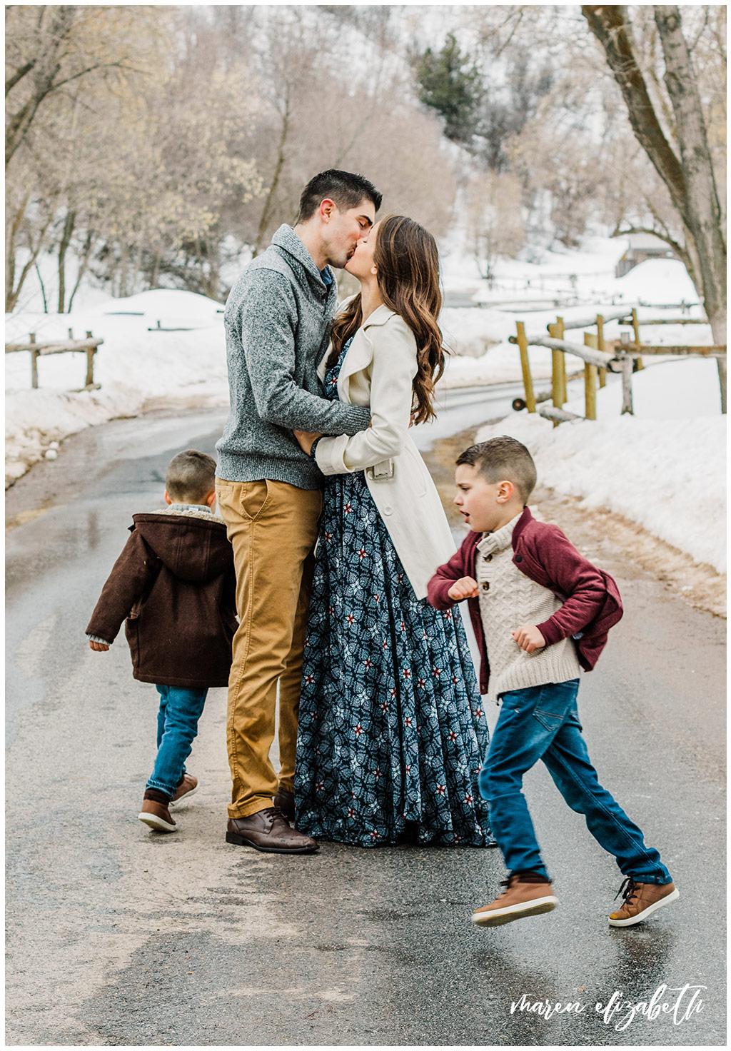 Family pictures of a family of four at Big Springs Park in Provo Canyon in the snow shot by Maren Elizabeth Photography in March. | Arizona Family Photographer