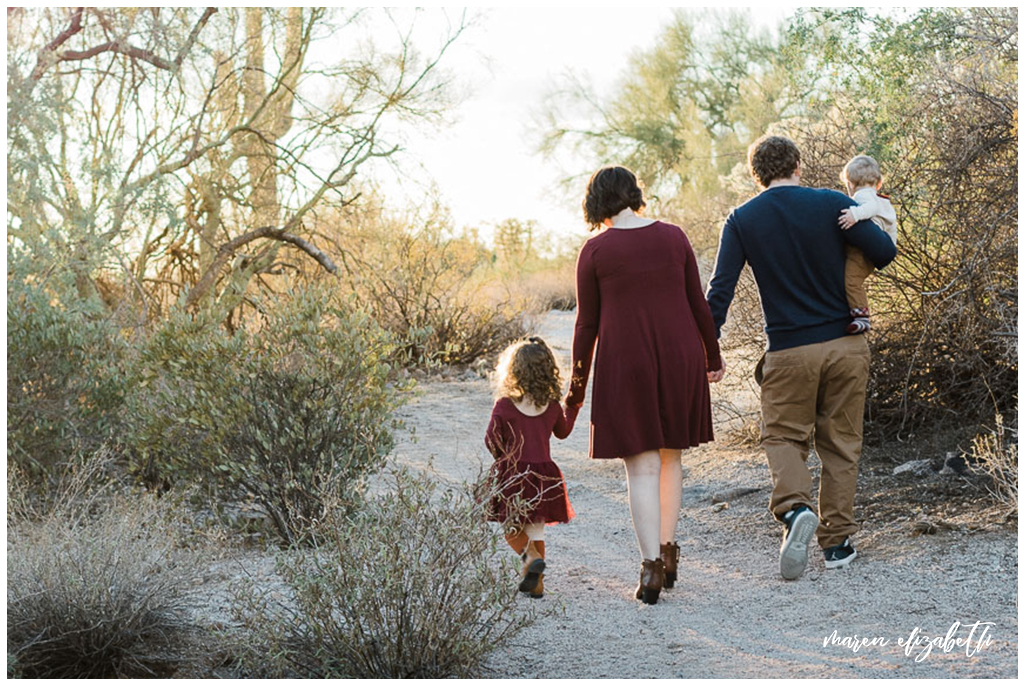 Usery Pass Family Pictures featuring a desert backdrop and navy and maroon coordinated outfits. Maren Elizabeth Photography | Gilbert, AZ