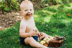 Outdoor, Wild One, little boy cake smash captured by Maren Elizabeth Photography. I love doing cake smashes outside because it makes clean up so easy! | Arizona Family Photographer