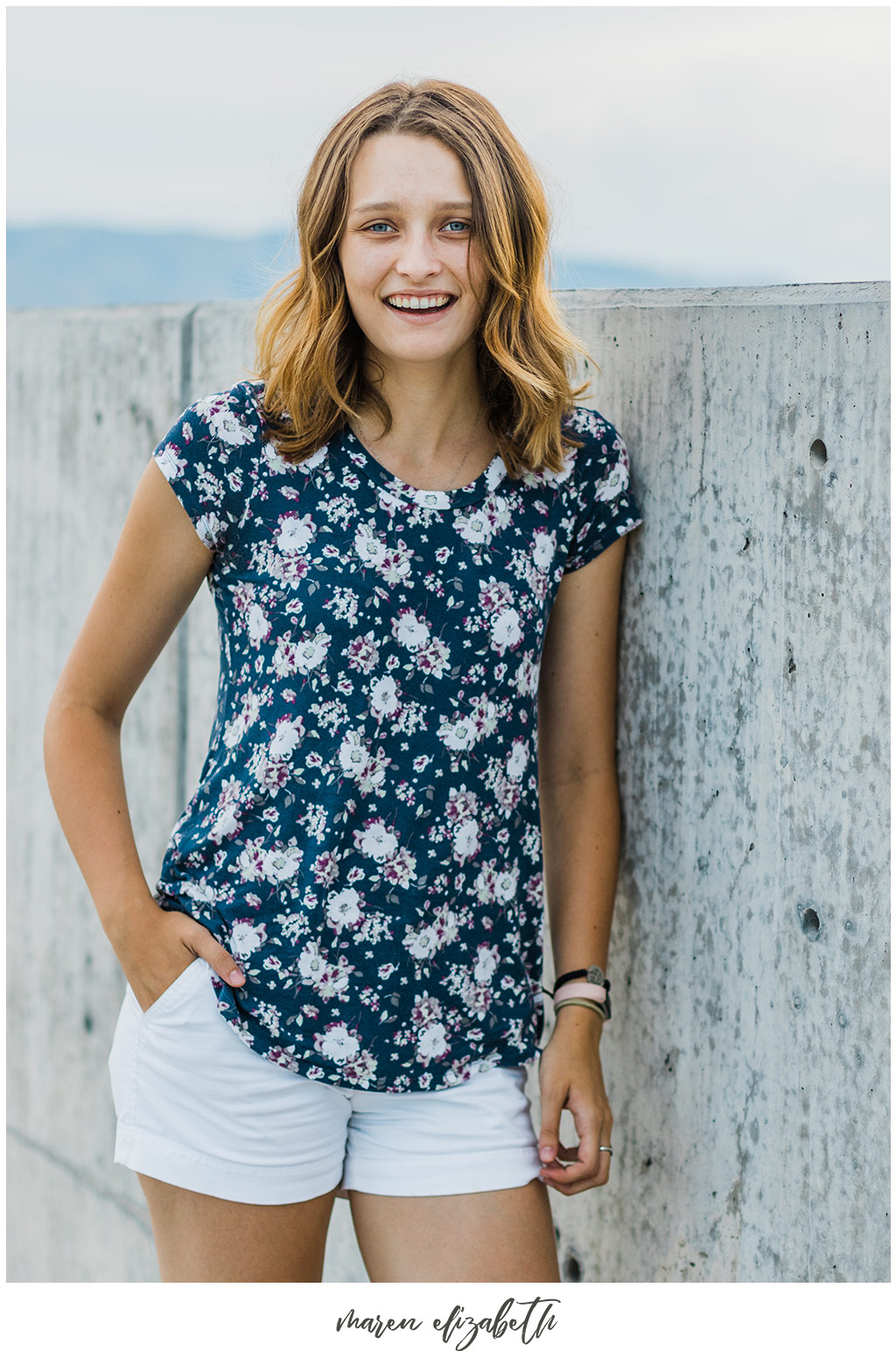 Portraits by Maren Elizabeth Photography taken on the top level of the Utah Valley University parking garage. | Arizona Senior Photographer