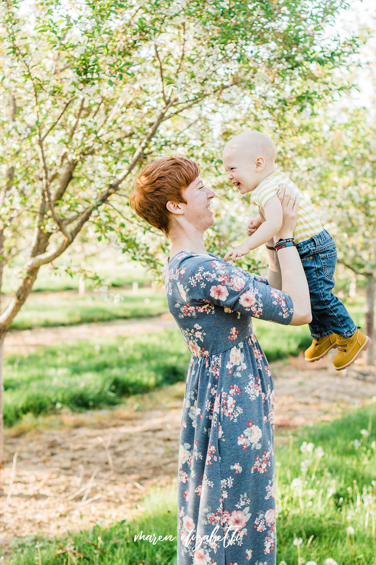 Spring family pictures in the blossoms at Rowley's Red Barn in Santaquin, UT | Maren Elizabeth Photography | Arizona Photographer