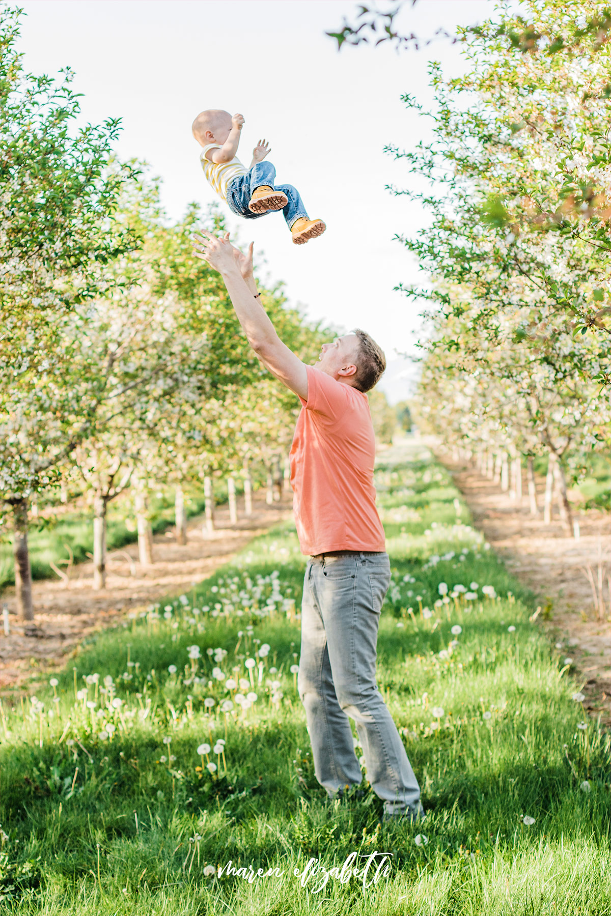 Spring family pictures in the blossoms at Rowley's Red Barn in Santaquin, UT | Maren Elizabeth Photography | Arizona Photographer